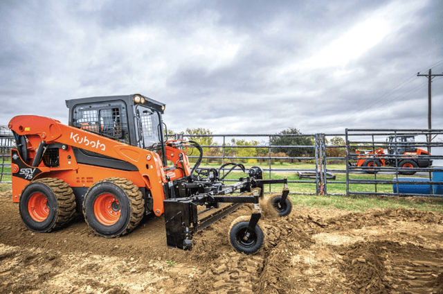 Skid steer loader with a leveling attachment