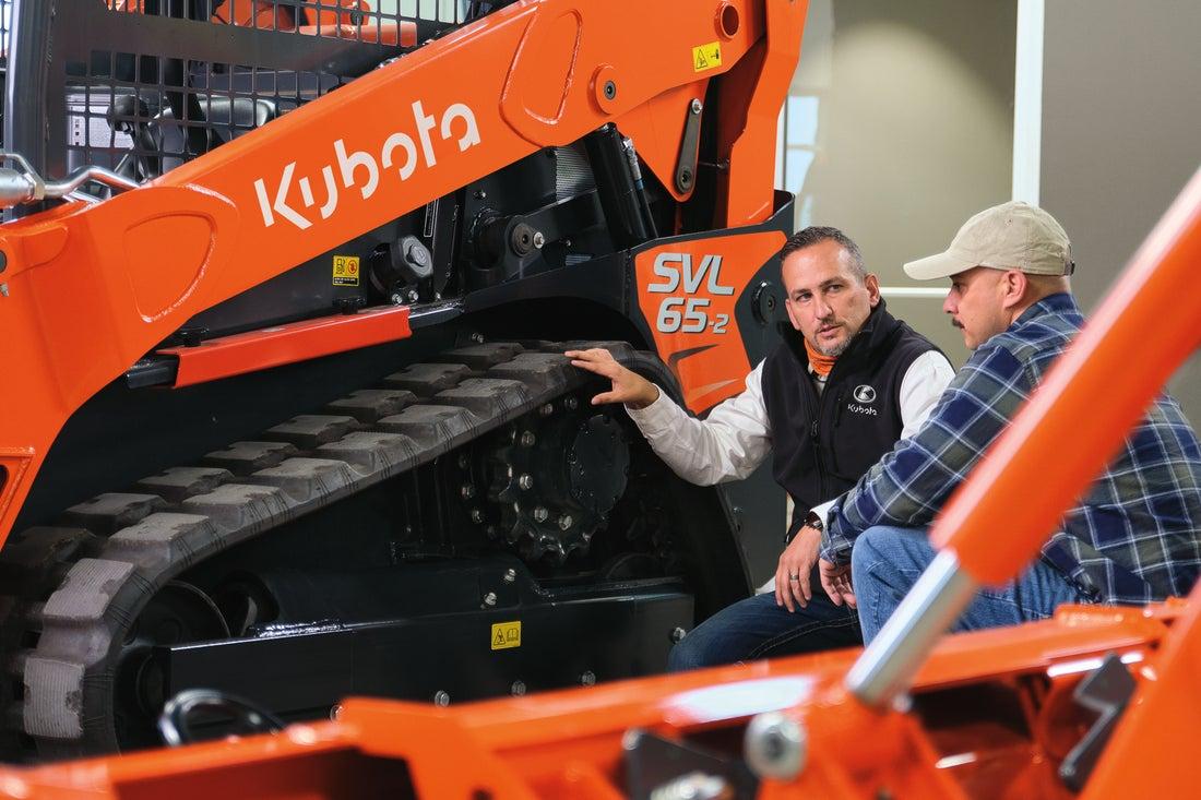 Kubota technician showing loader