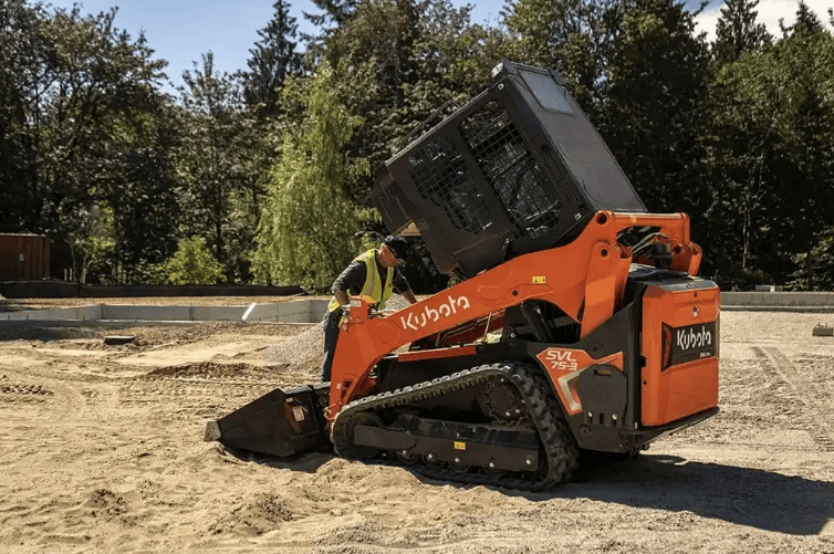 Man getting into loader