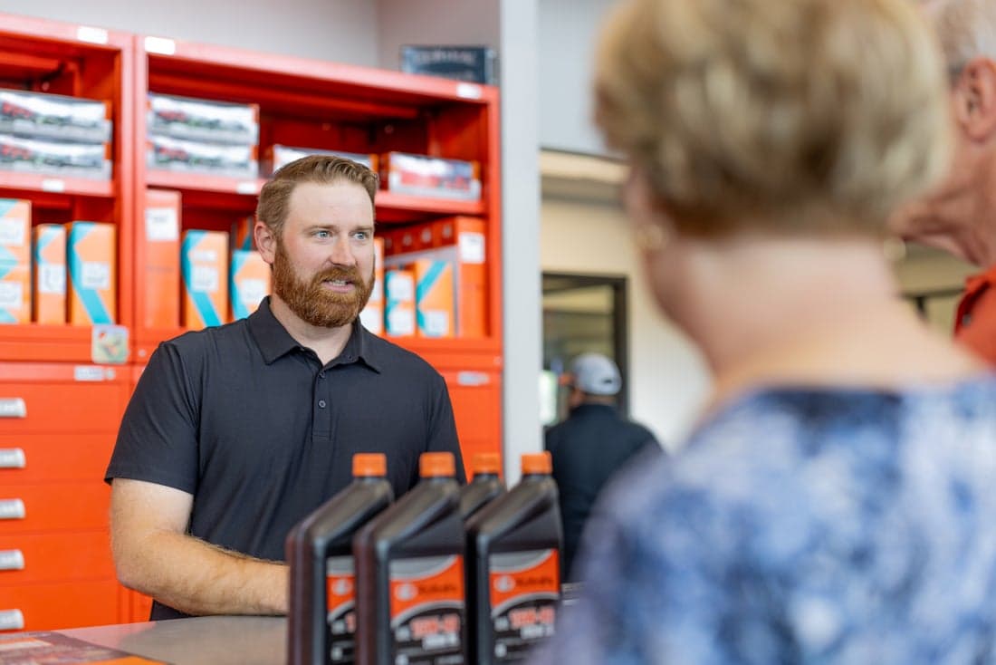 Kubota Employee helping customer
