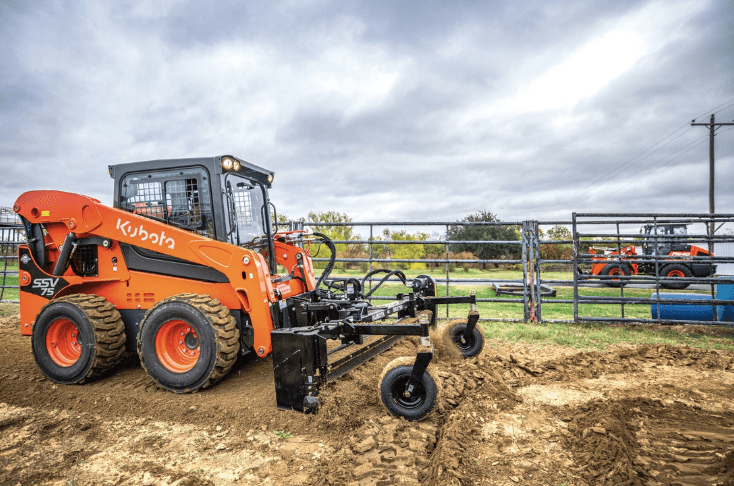 Skid steer loader with a leveling attachment