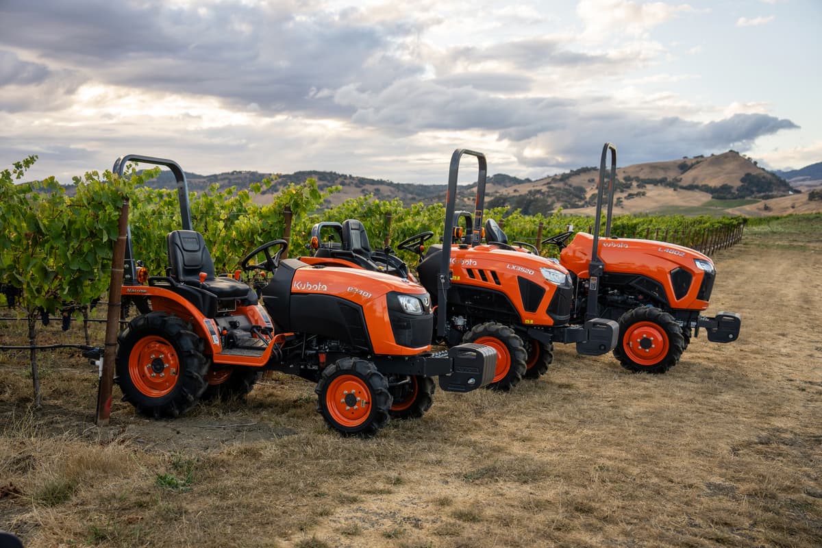 Three Kubota B2401 tractors in vineyard